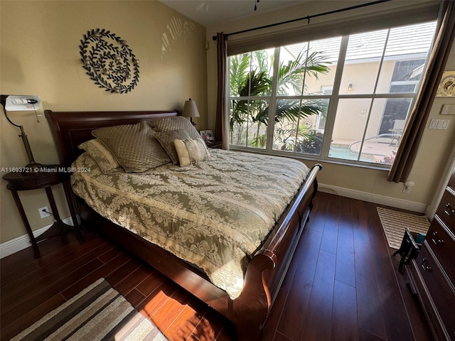 bedroom featuring dark hardwood / wood-style floors