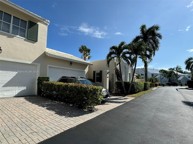 view of home's exterior with a garage