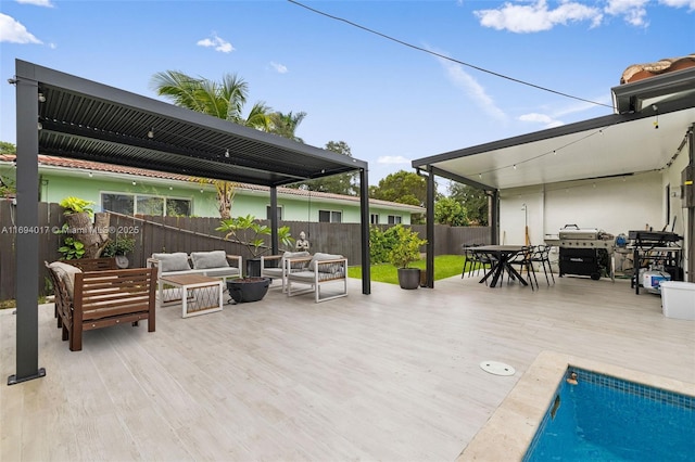 view of patio featuring an outdoor living space, a swimming pool side deck, and a grill