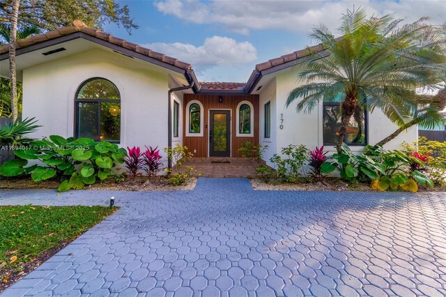 view of patio / terrace with a swimming pool side deck, grilling area, and an outdoor living space