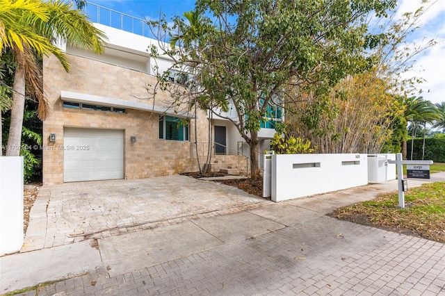 view of front of house with a garage