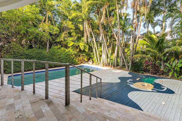 view of pool with a patio area