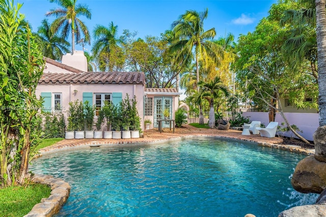 view of pool featuring fence and a fenced in pool