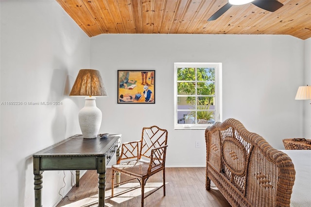 home office with hardwood / wood-style flooring, ceiling fan, wooden ceiling, and vaulted ceiling