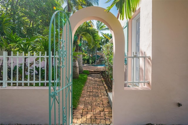 view of gate featuring fence