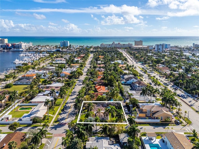 aerial view featuring a water view and a view of city