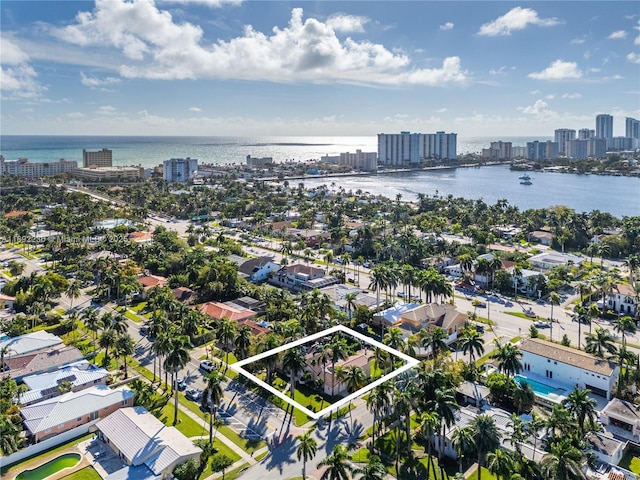 aerial view featuring a view of city and a water view