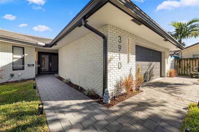 exterior space with a garage