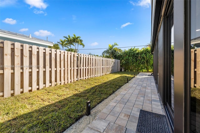 view of yard with a fenced backyard