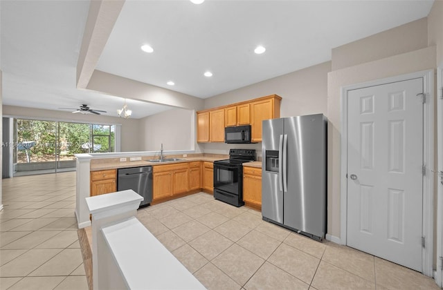 kitchen with black appliances, ceiling fan, light tile patterned floors, and sink