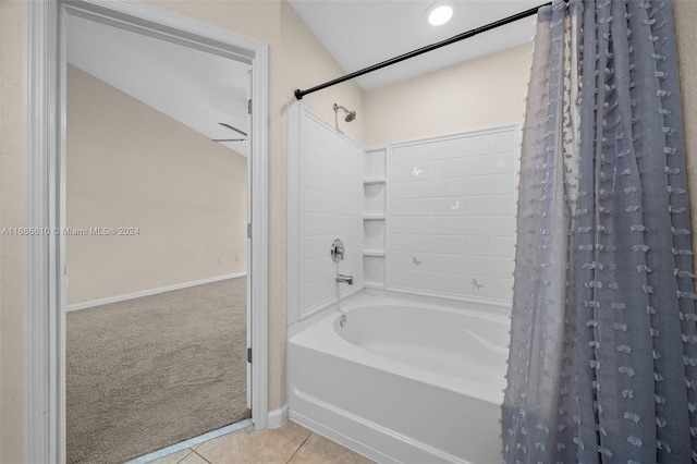 bathroom featuring tile patterned floors and shower / bathtub combination with curtain