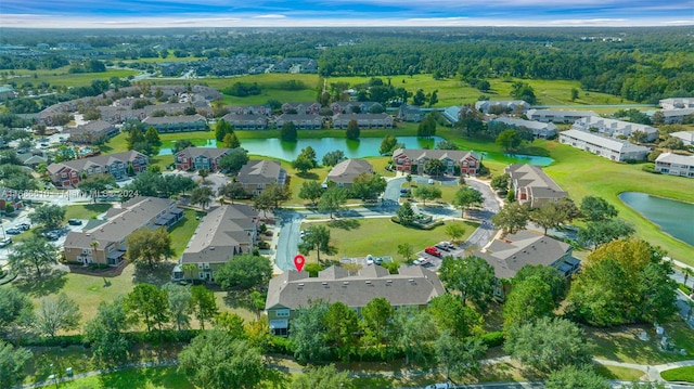 drone / aerial view with a water view