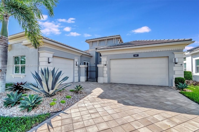 view of front of home with a garage