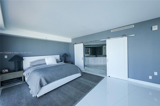 bedroom with a barn door