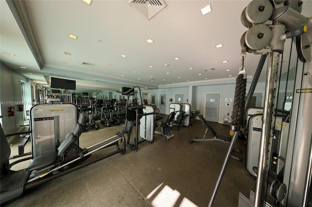 exercise room with crown molding