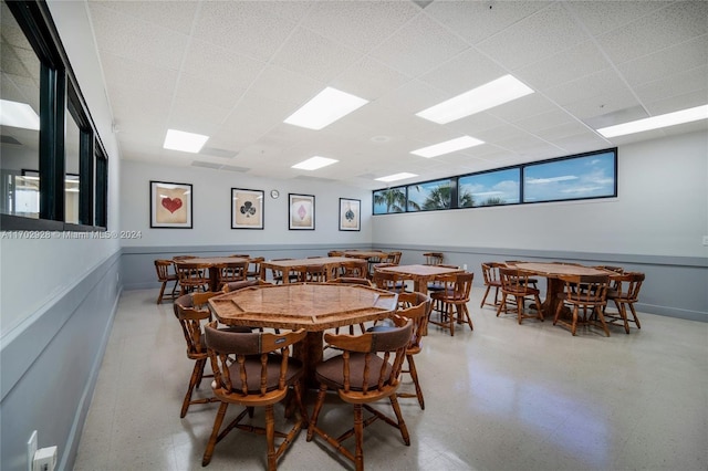 dining space featuring a paneled ceiling