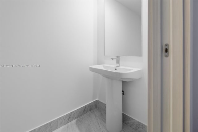 bathroom featuring tile patterned flooring