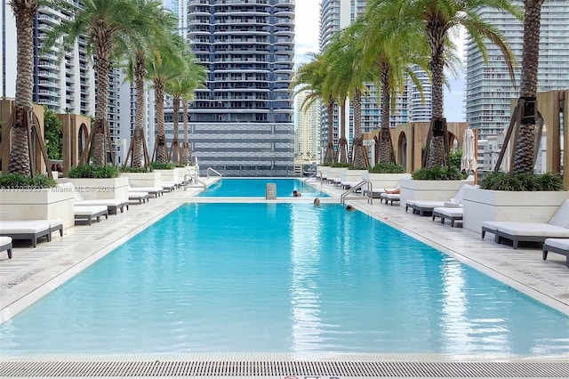 view of swimming pool with a patio area