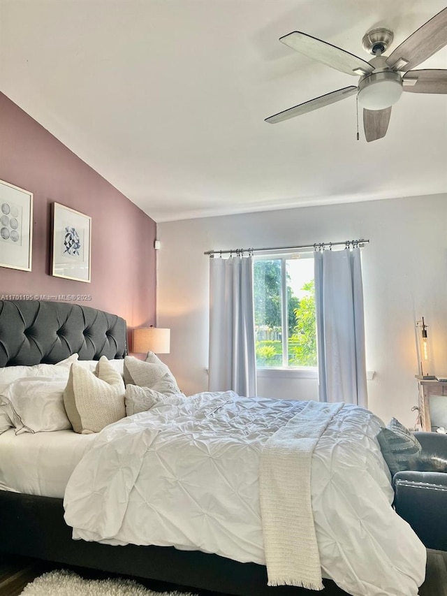 bedroom featuring ceiling fan