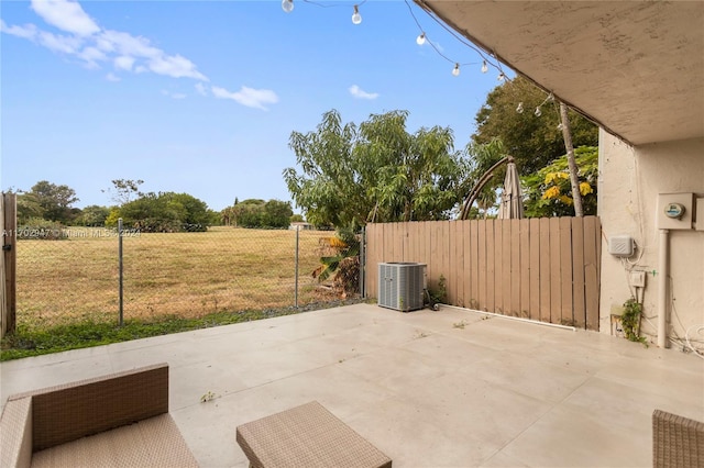 view of patio with central AC unit