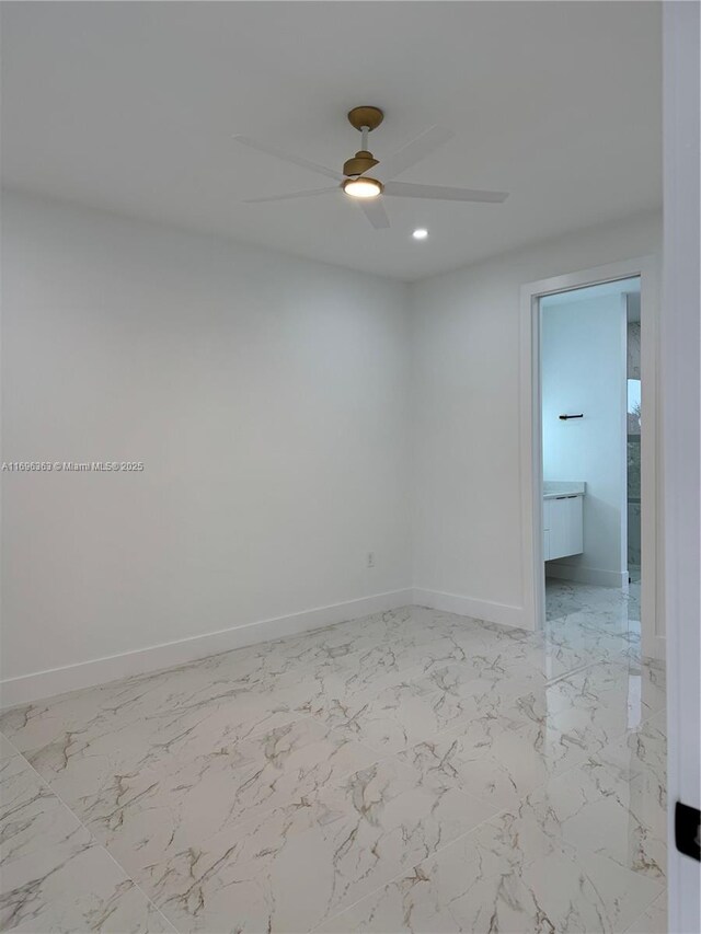 spare room featuring ceiling fan