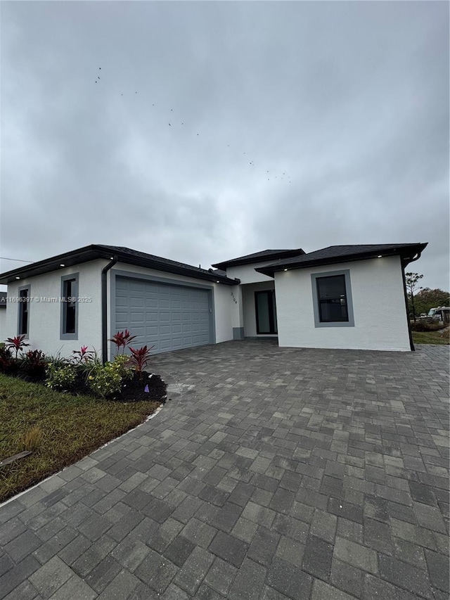 view of front of property featuring a garage