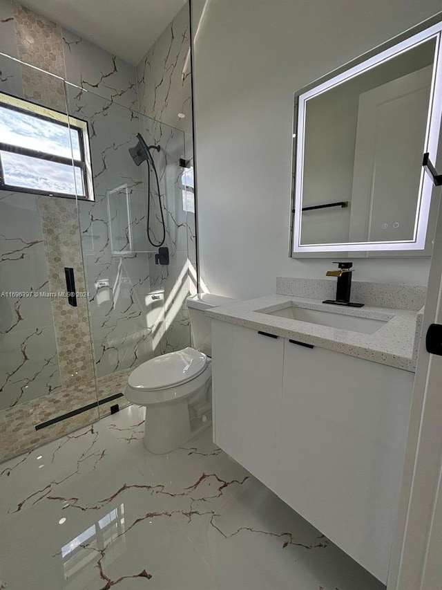 bathroom featuring vanity, toilet, and walk in shower