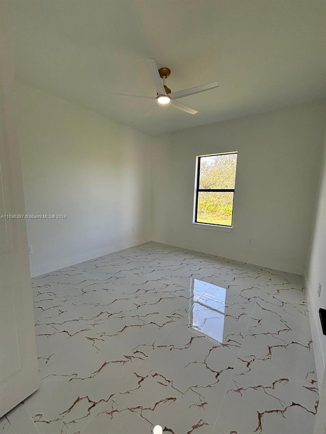 empty room with ceiling fan