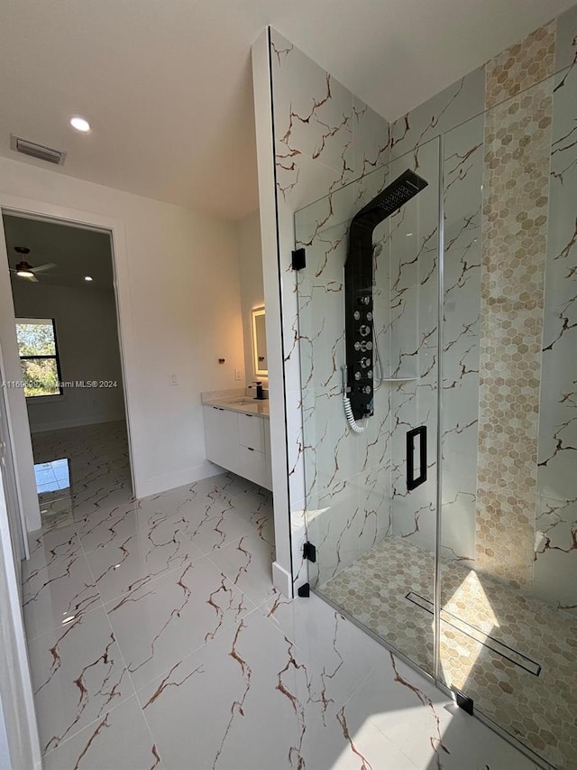 bathroom with vanity and walk in shower