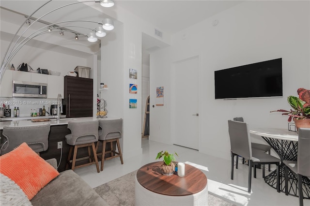 living room featuring light tile patterned floors