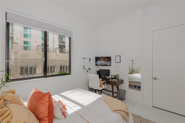301 Altara Ave Unit 305, Coral Gables, FL 33146 - bedroom featuring tile patterned flooring and an office area