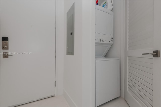 301 Altara Ave Unit 305, Coral Gables, FL 33146 - washroom with stacked washer and clothes dryer and electric panel