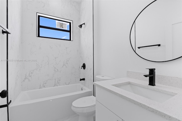 bathroom with toilet, tub / shower combination, and vanity