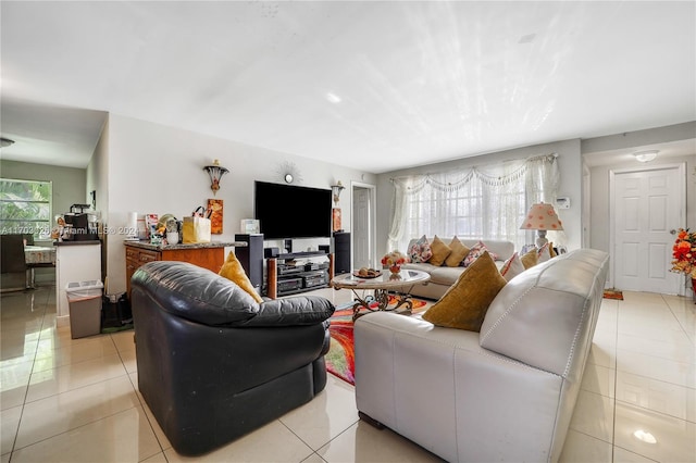 living room with light tile patterned floors