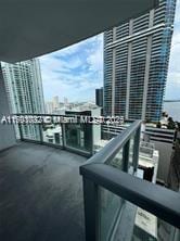 balcony featuring a city view