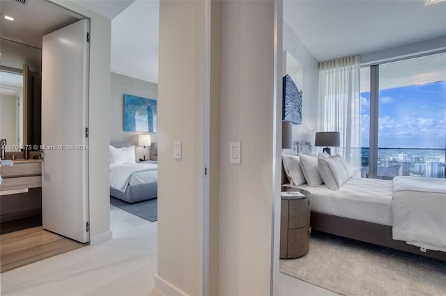 bedroom featuring light wood-type flooring