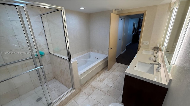 bathroom featuring separate shower and tub, tile patterned flooring, and vanity