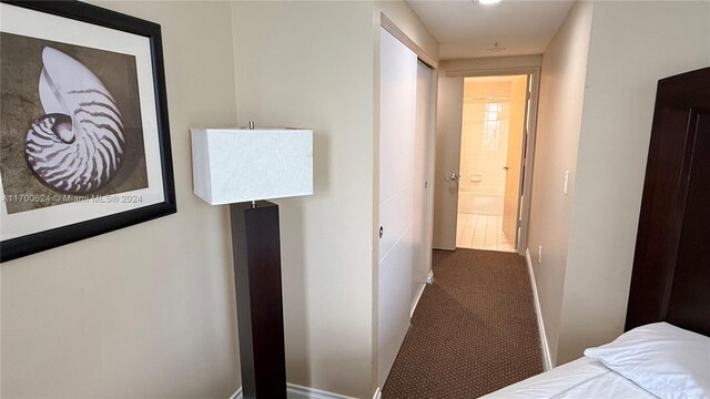 hallway featuring carpet floors