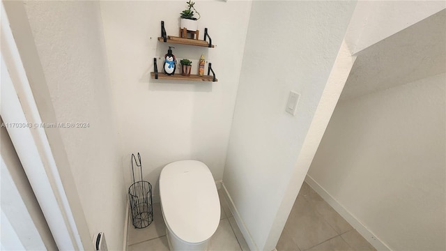 bathroom featuring tile patterned flooring