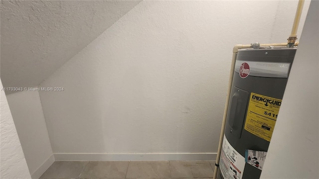 utility room with electric water heater