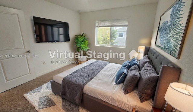 bedroom featuring carpet