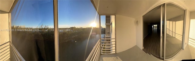 view of balcony at dusk