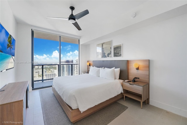 bedroom with floor to ceiling windows, access to outside, and ceiling fan