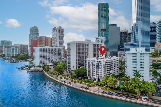 property's view of city with a water view