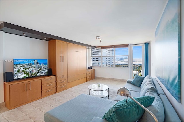 living room with light tile patterned floors