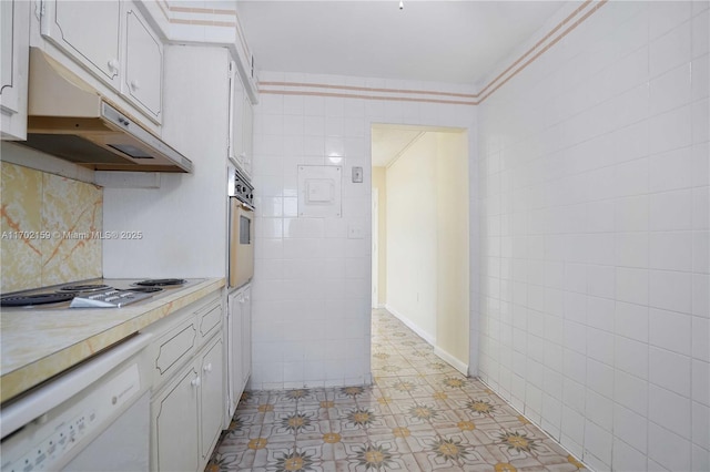 kitchen with white cabinetry, stovetop, dishwasher, and stainless steel oven