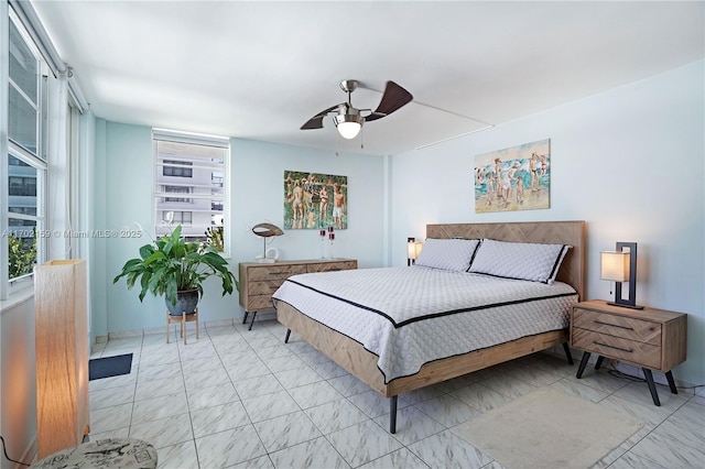 bedroom featuring ceiling fan