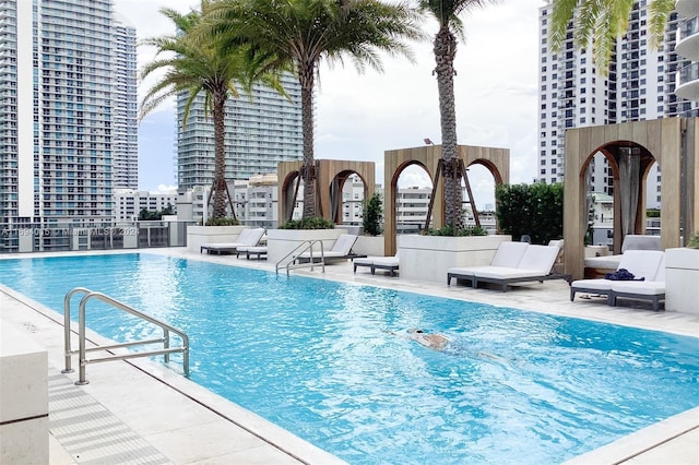 view of swimming pool featuring a patio