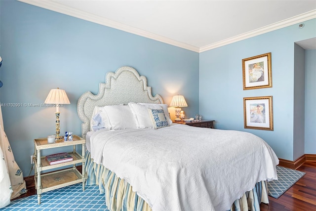 bedroom featuring dark hardwood / wood-style floors and crown molding