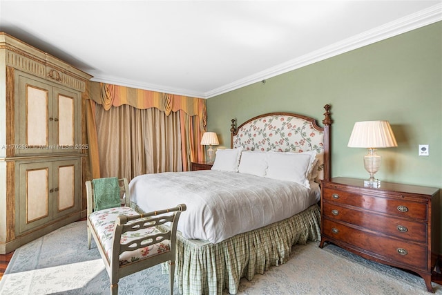 bedroom with crown molding